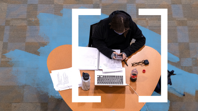 student studying alone at desk