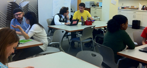 writing center staff working with students